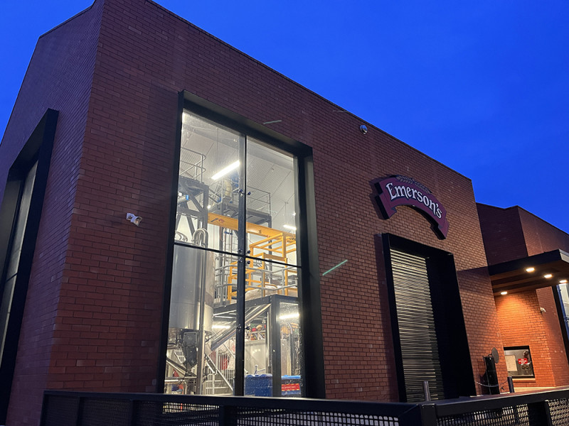 Emersons Building with stainless brewey tanks in the window