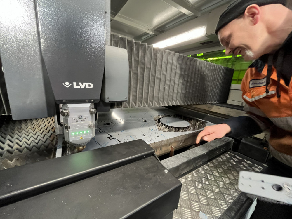 Laser operator Reuban checking cut quality on the Phoenix FL4029 laser