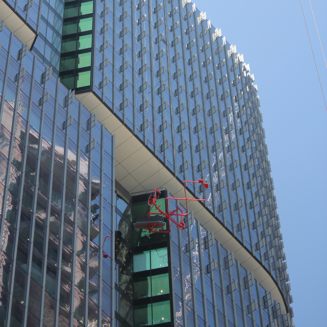 Barangaroo Extending BMU accessing recessed spaces for cleaning and maintenance tile